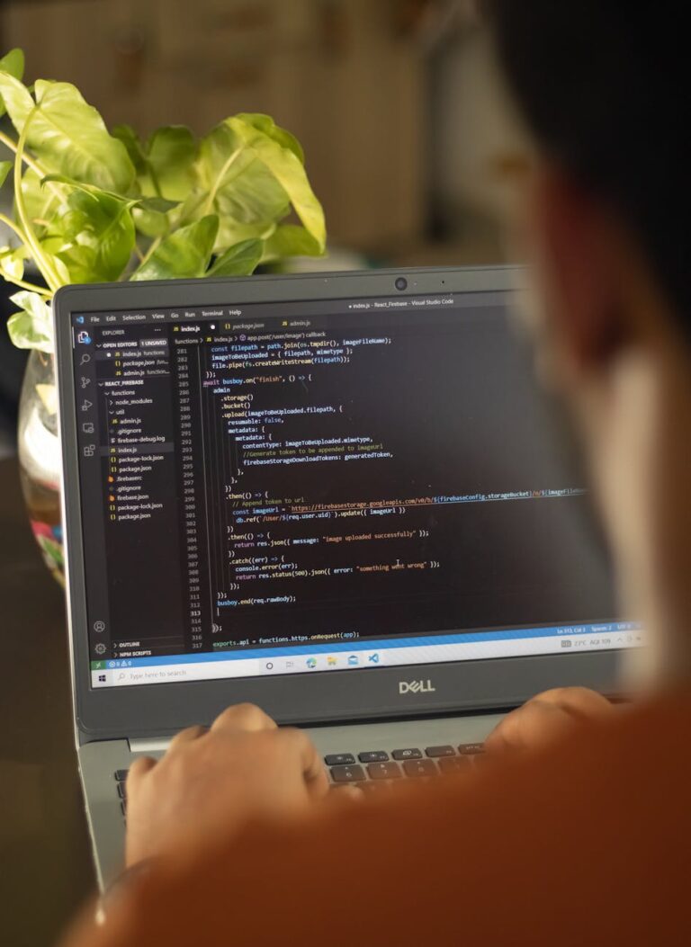 person using gray laptop